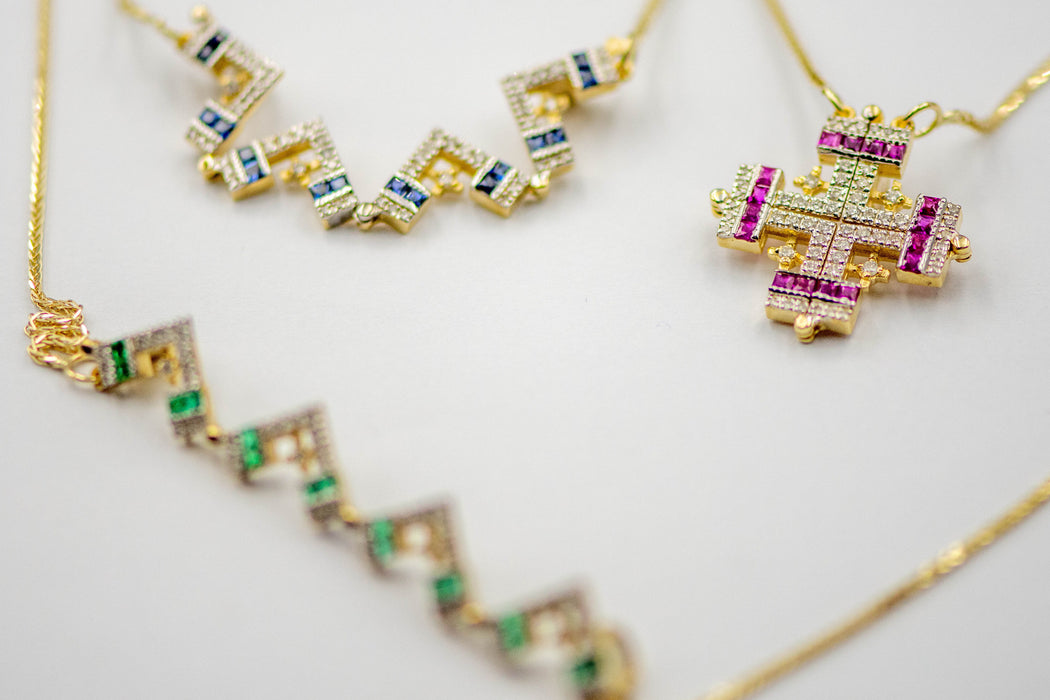 Jerusalem cross with Nano New Testament chip set with diamonds and gemstones . 18k gold. 8-2-002