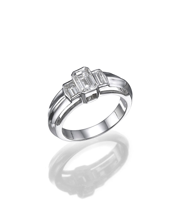 A Solitaire , engagement Ring One carat Emarald cut Diamond. 18K gold ring. 9036