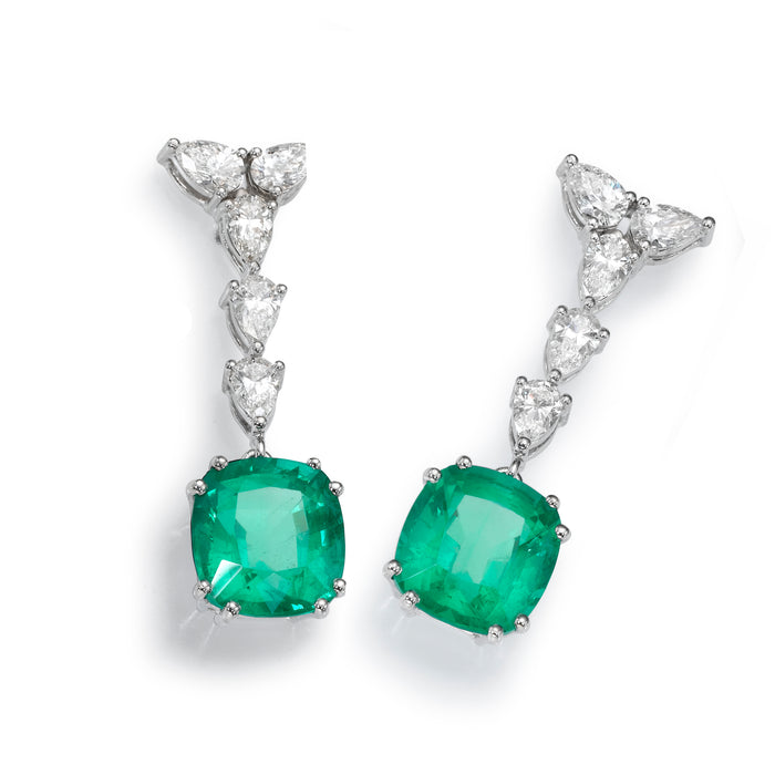 custom made earrings , diamonds and gems.