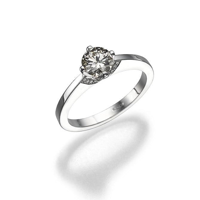 A Solitaire  Ring  0.75 Round cut Diamond. 18K gold ring. 9054