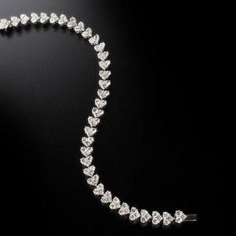 Diamonds Tennis Bracelets with  Princess&Half moons cut diamonds. 18K gold. 2506
